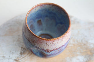 a close up of a cup on a table